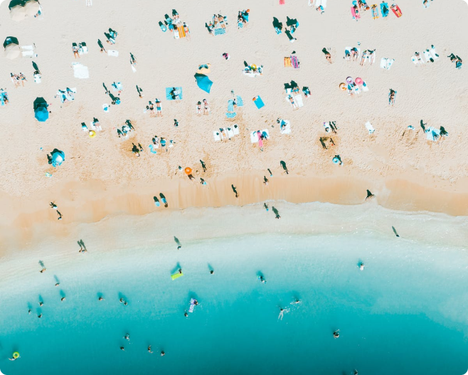 elivated arial view of a beach and shortline directly below.